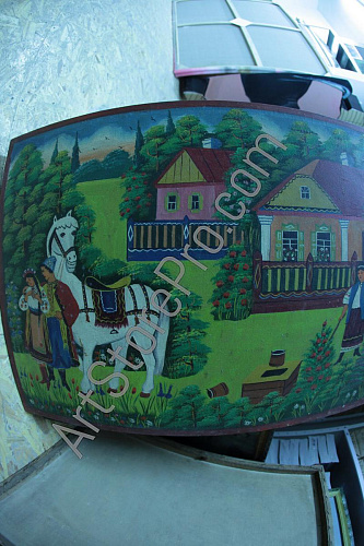 Козак з дівчиною біля коня